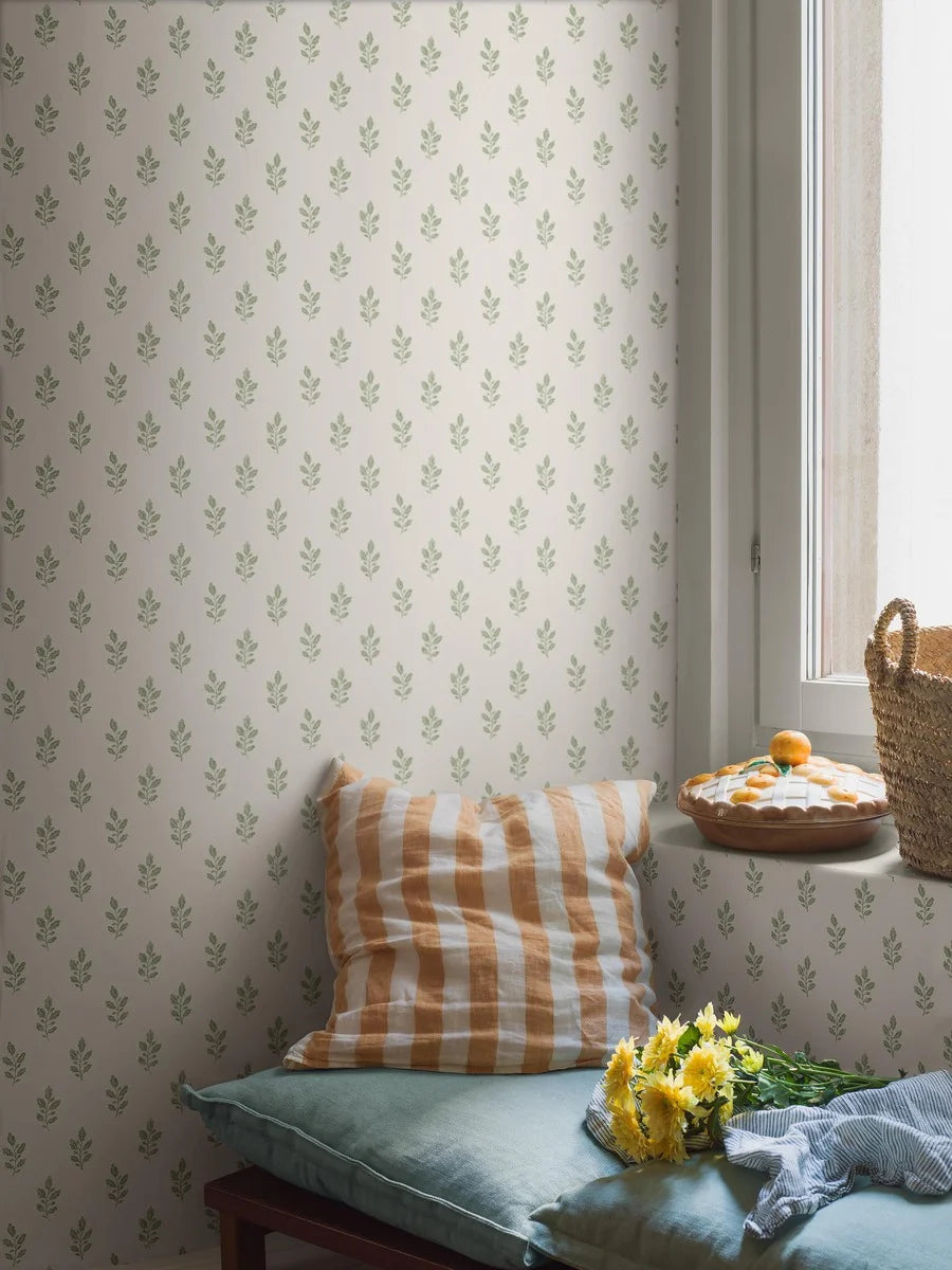 Our Little Oak wallpaper in fresh green on a creamy white base brings a lively yet soothing touch to your walls.