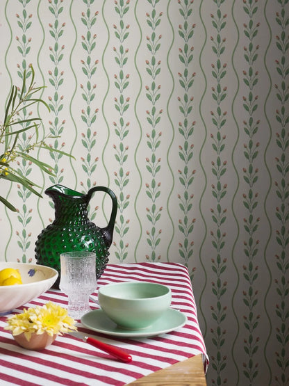 Colored in fresh leafy green tones punctuated with soft red detailing on a pure white background, our Flower Buds wallpaper brings a light, lively energy to your walls. 