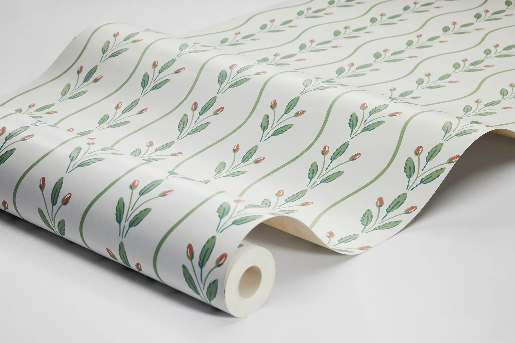 Colored in fresh leafy green tones punctuated with soft red detailing on a pure white background, our Flower Buds wallpaper brings a light, lively energy to your walls. 