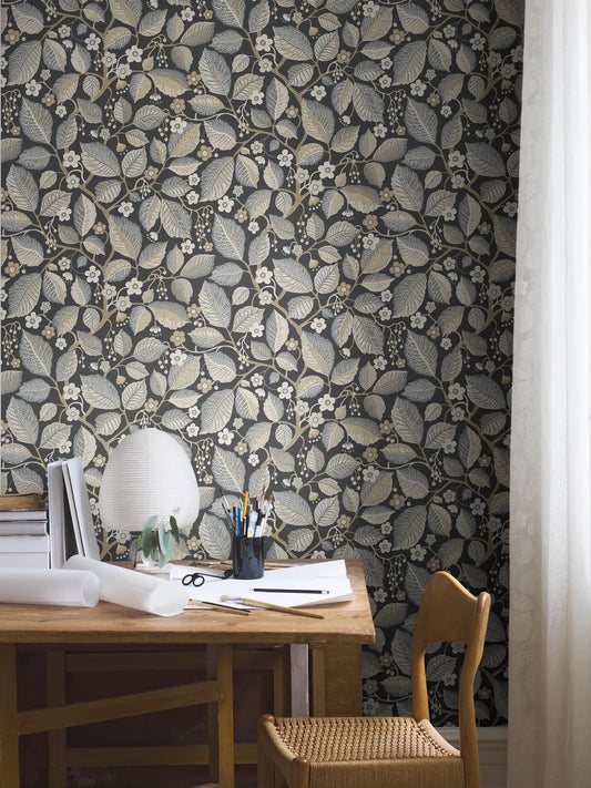 Set on a bold black base with grey, white, beige and brown accents, this Elm Tree wallpaper offers a sophisticated yet versatile feel.