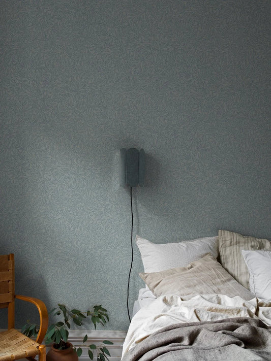 Colored in mild blue tones, this Salix Alba wallpaper graces walls with its gentle, calming presence. 