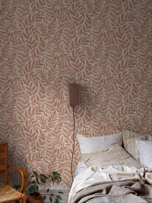 Colored in soft pale red on a cream background, our Ferns wallpaper combines warmth with artistic charm. 