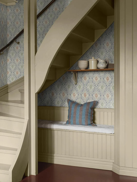 Eye catching and timeless, our Kvarnholmen wallpaper draws inspiration from a stencil held in Kalmar County Museum’s collections.