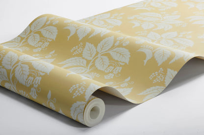 Our Tengbergska wallpaper offers a warm and cheerful take on an early 19th-century French wallpaper design, featuring a grey and white print on a yellow background.