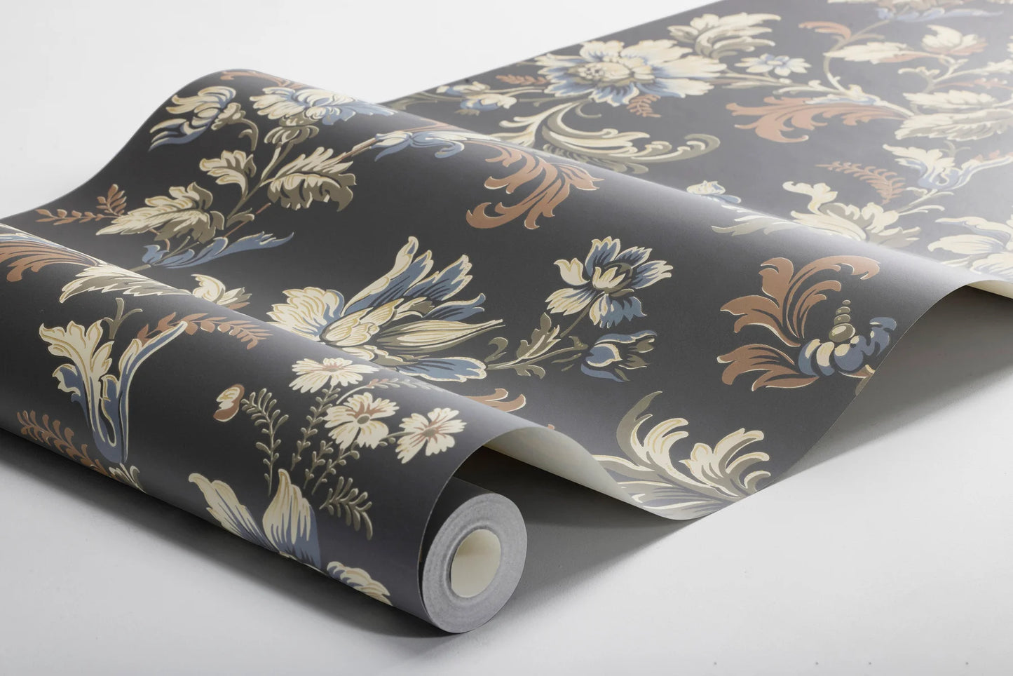 Set on a bold black background, with floral strands in tones of olive green, brown and blue, our Elvira wallpaper shimmers with golden detail.