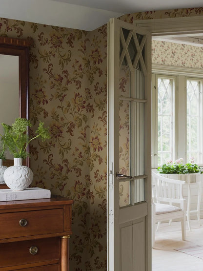 Evocative and autumnal, our Elvira wallpaper is colored in its original 1900s palette – olive, maroon and purple tones on a warm beige background. 