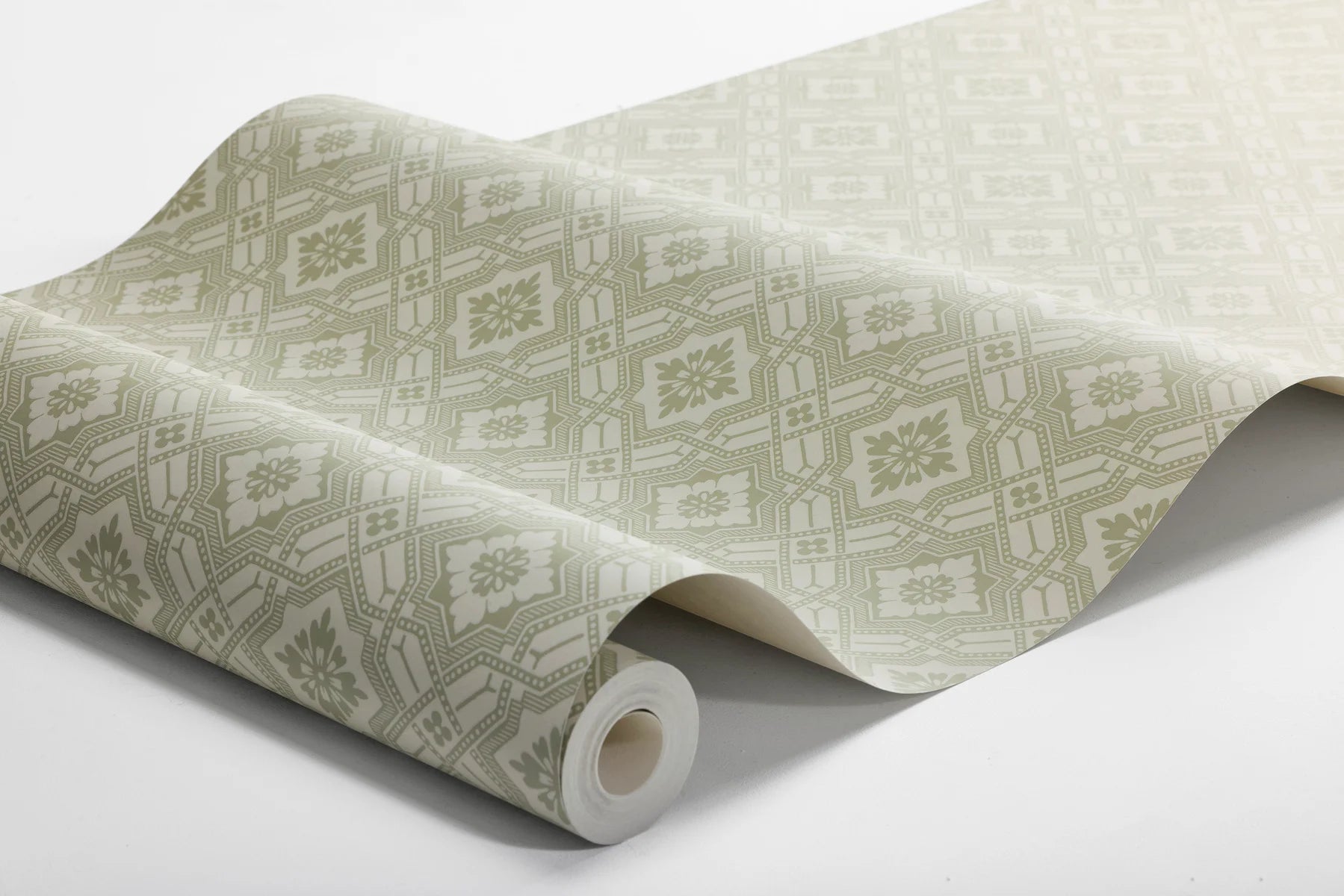 Colored in a mild green tone, our Friedrich wallpaper adds soft yet ordered charm to its surrounding space.