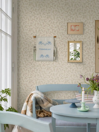  Like soft clouds drifting across the wall, the subtle texture of our Änggården wallpaper offers a calming, simple surface that reflects the 1930s move towards understated modernism. 