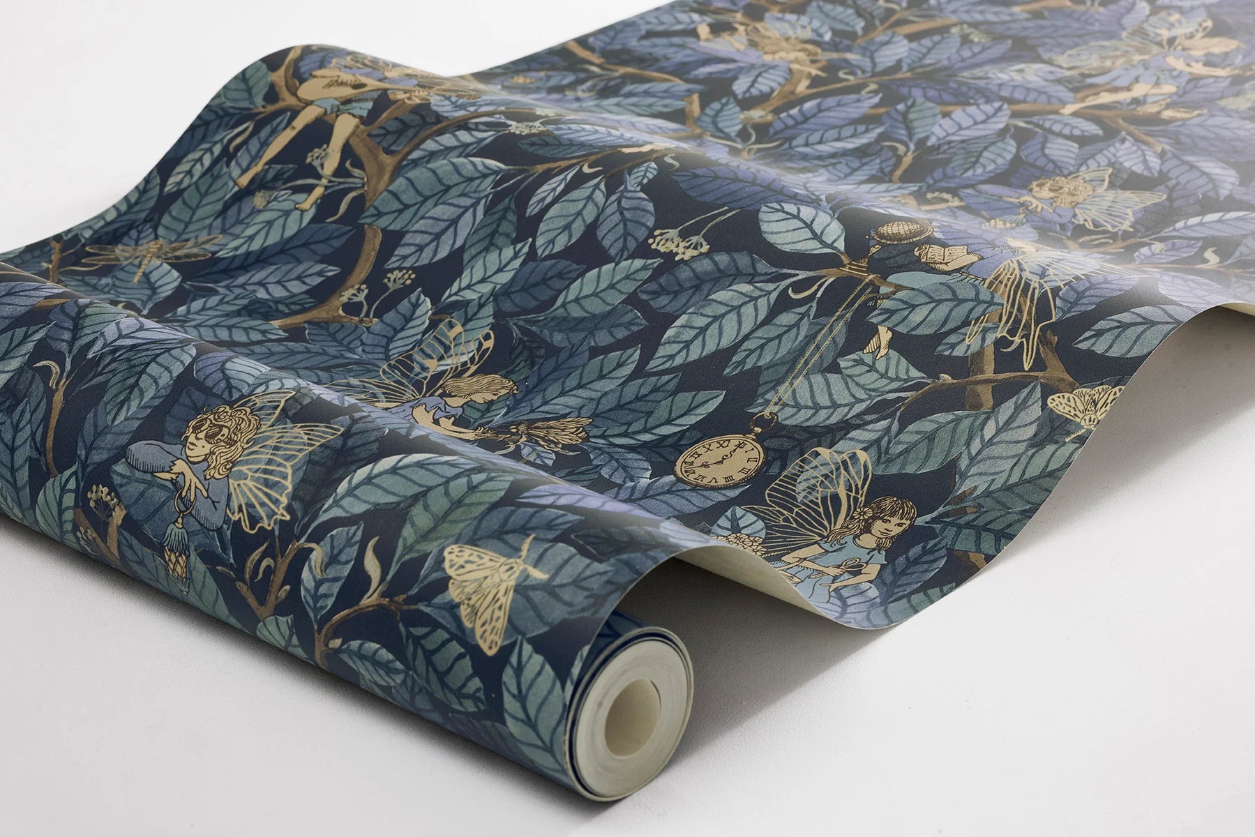 Bring a sense of mystery and enchantment to your home with our Fairies wallpaper set on a midnight blue background with blue foliage and shimmering golden details. 