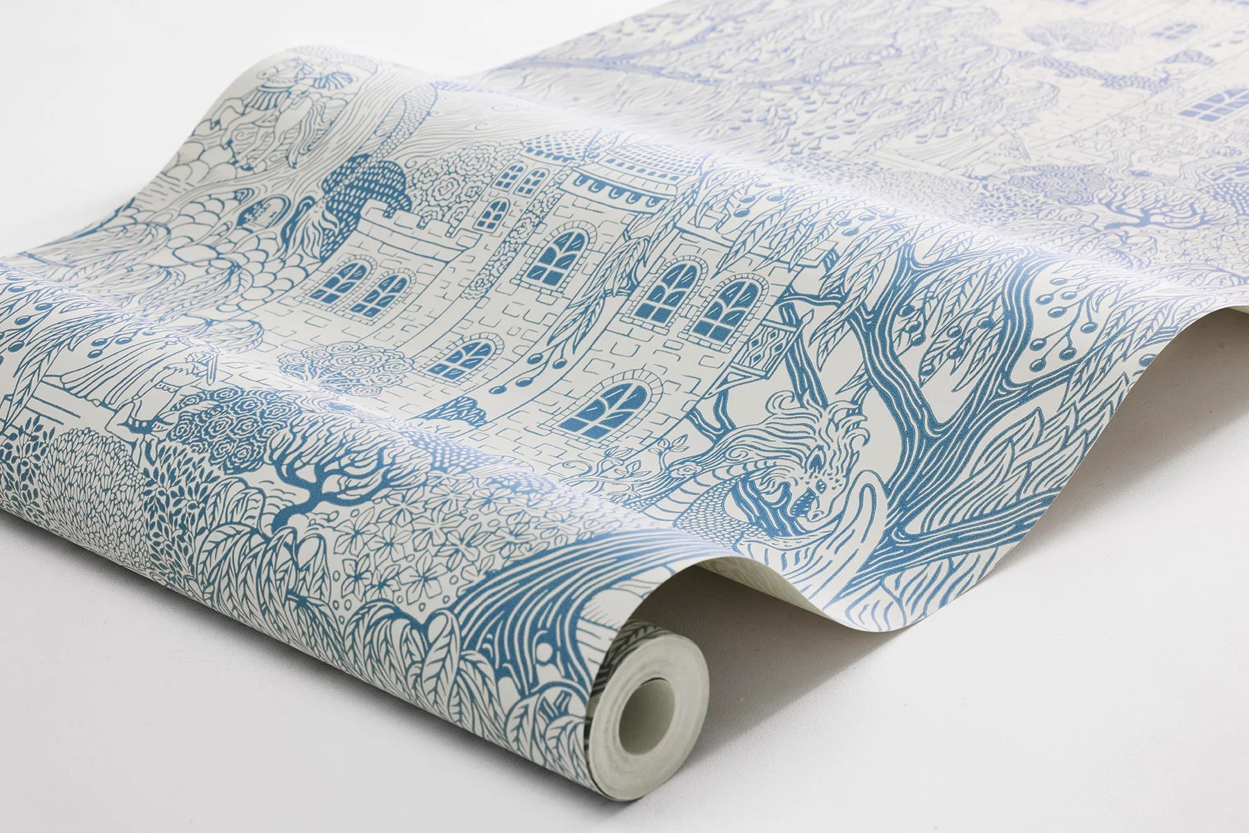 Create your very own fairy tale with our Kingdom of the Willow wallpaper colored in a muted blue on an eggshell-white background in a surface print.