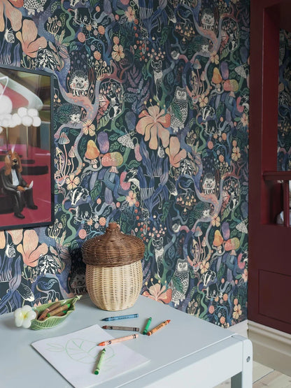 Colored in rich, dark tones of purple, pink, blue, and green on a deep blue-black background, our Magic Woods wallpaper is both organic and contemporary.