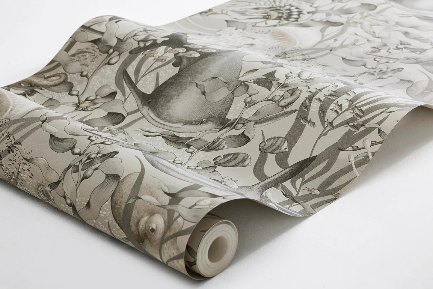 Capture the quiet mystery of the ocean depths with our Underwater Magic wallpaper colored in a grey-beige tone-on-tone design. 