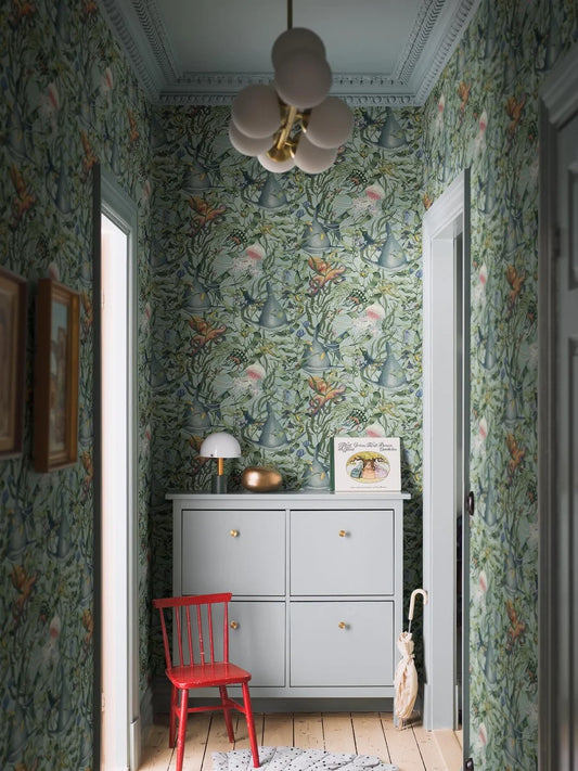 Dive into a vibrant underwater world set against an aqua-green background with our Underwater Magic wallpaper. 