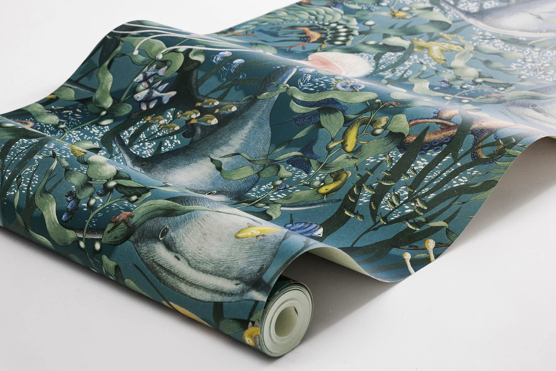An enchanting underwater scene unfolds in our Underwater Magic wallpaper set on a midnight blue background with rich multi-colored detailing.