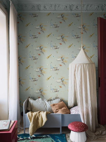 Embark on a cosmic journey with our Space Adventure wallpaper set on a soft mint green background with multi-colored and golden details.