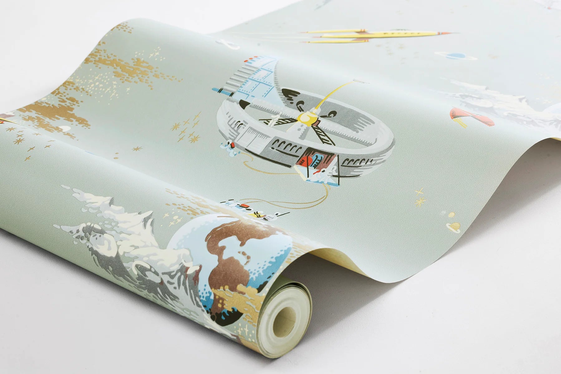 Embark on a cosmic journey with our Space Adventure wallpaper set on a soft mint green background with multi-colored and golden details.