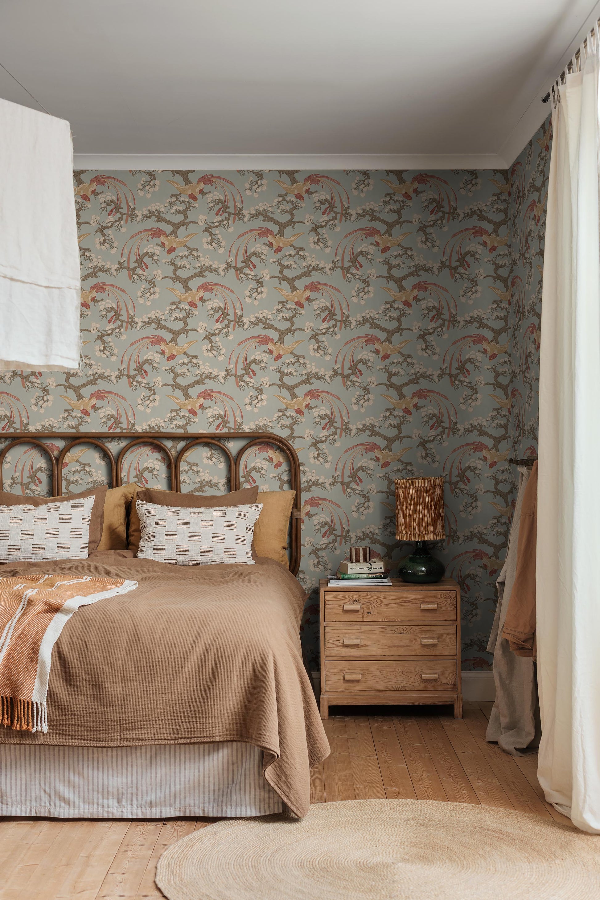 This version of our Fenix wallpaper comes in a fresh light green palette with terracotta, white and brown detailing.