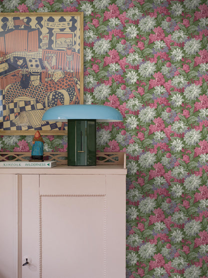 In its original colorway of green, vibrant pink, and soft purple, our Delilah wallpaper celebrates the beauty of blooming dahlias.