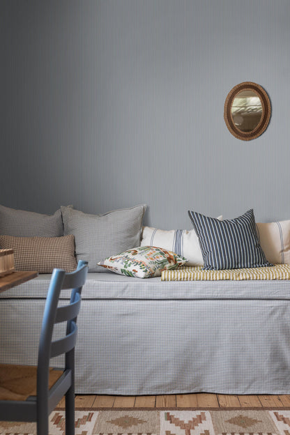In delicate shades of blue and grey, this version of our Sam wallpaper captures the beauty of quiet simplicity.