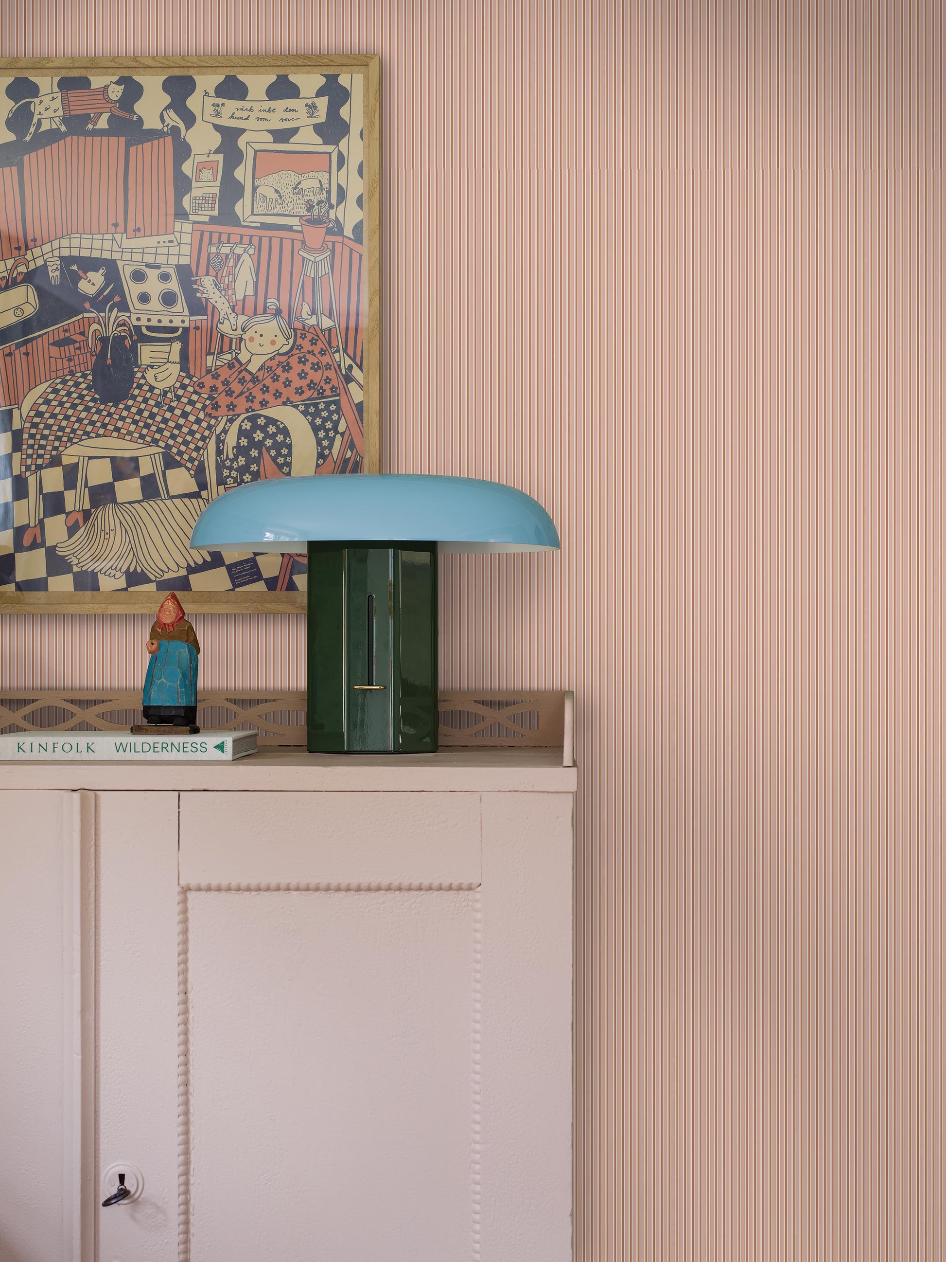 Colored in muted pink and red tones, our Sam wallpaper brings playful energy and warmth to the walls