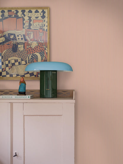 Colored in muted pink and red tones, our Sam wallpaper brings playful energy and warmth to the walls