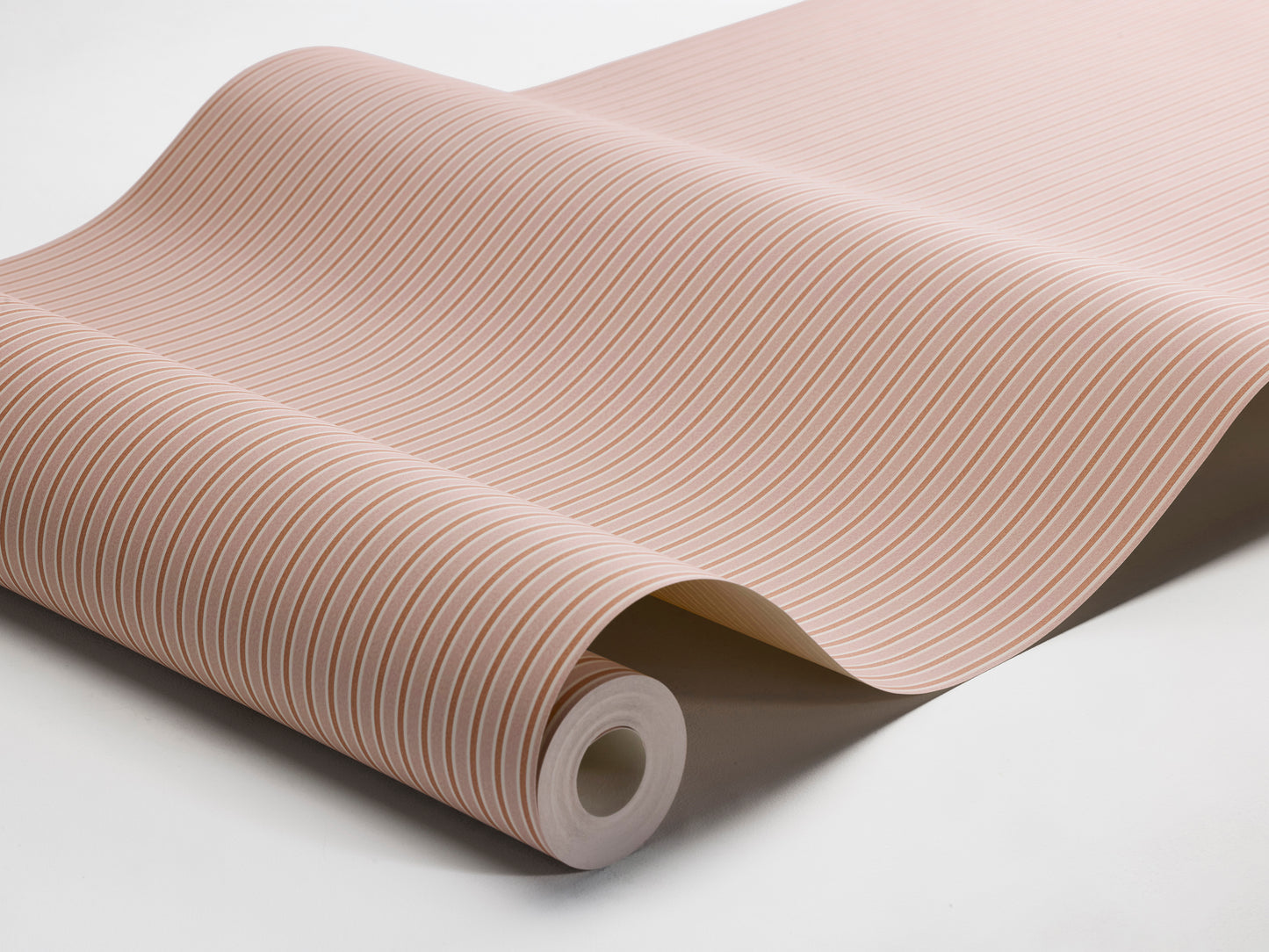 Colored in muted pink and red tones, our Sam wallpaper brings playful energy and warmth to the walls