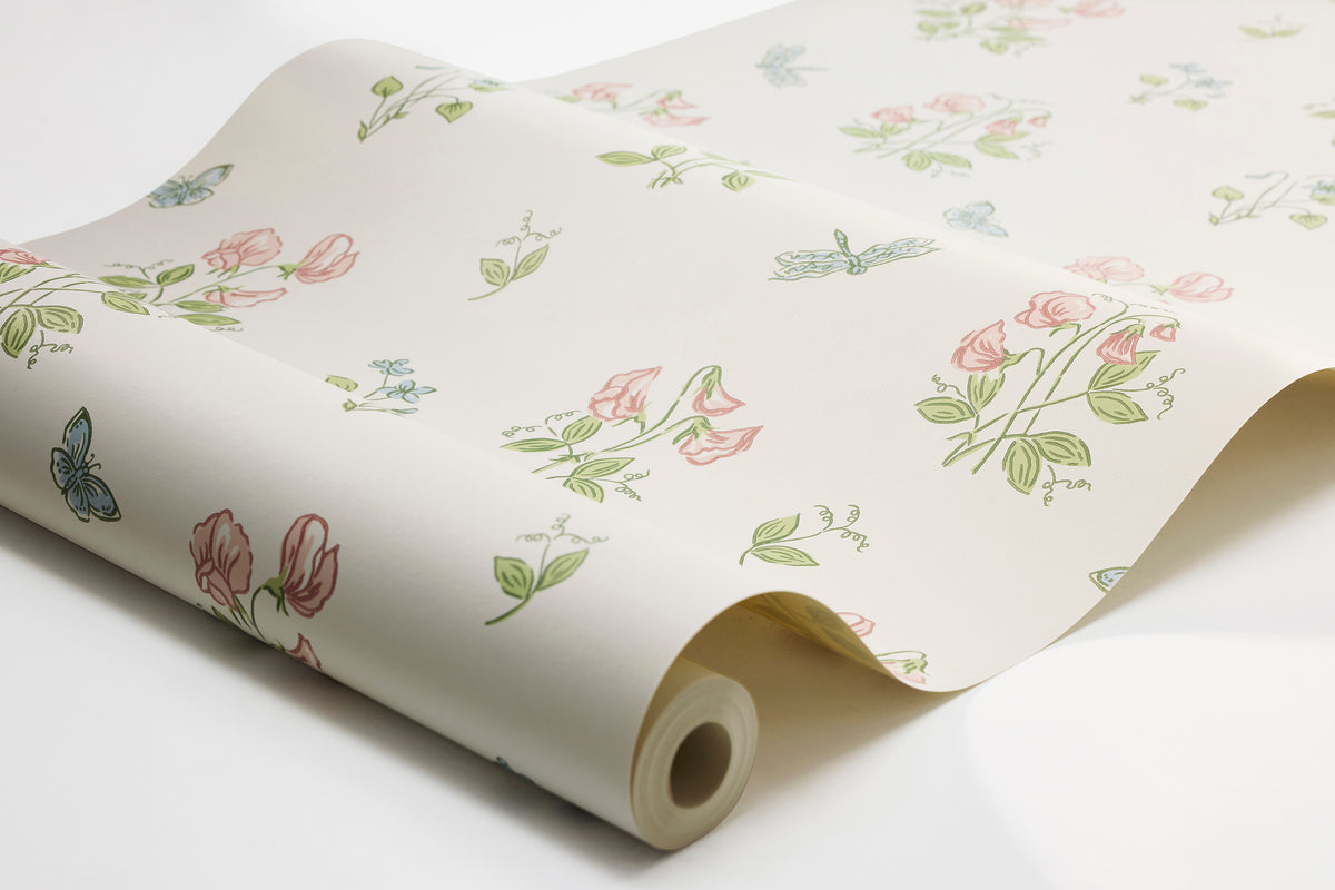  Luktärt is a Romantic, floral wallpaper with an airy pattern of sweet violets, sweet peas, and fluttering dragonflies and butterflies. 