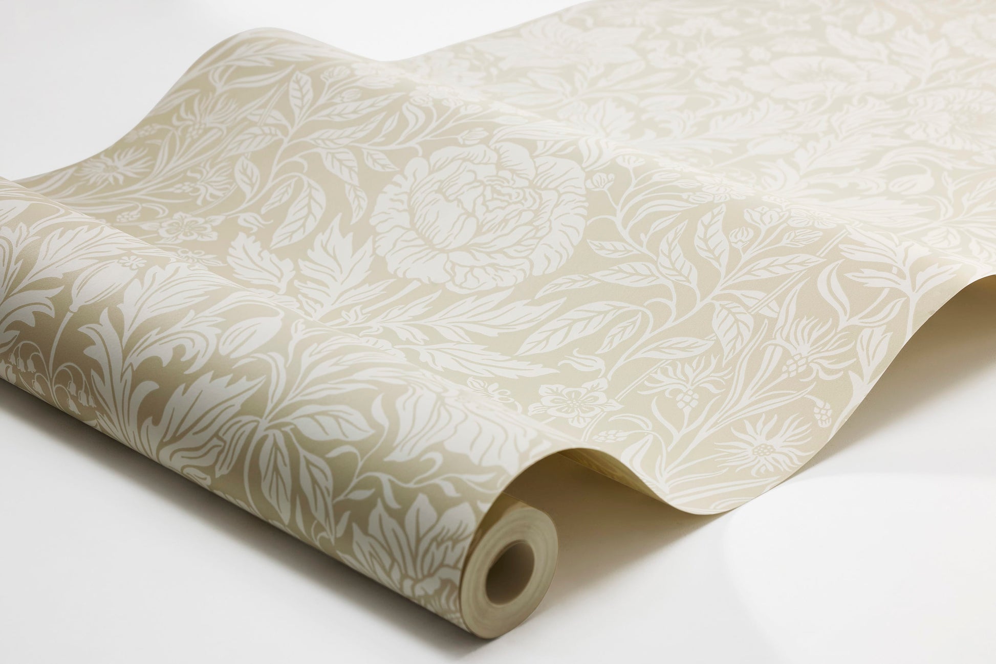 The light, large-floral wallpaper Hildasholm is adorned with a dense Arts and Crafts-inspired pattern made up of peonies, cornflowers, lily of the valley and other local plants from the gardens around Hildasholm manor house in Leksand.