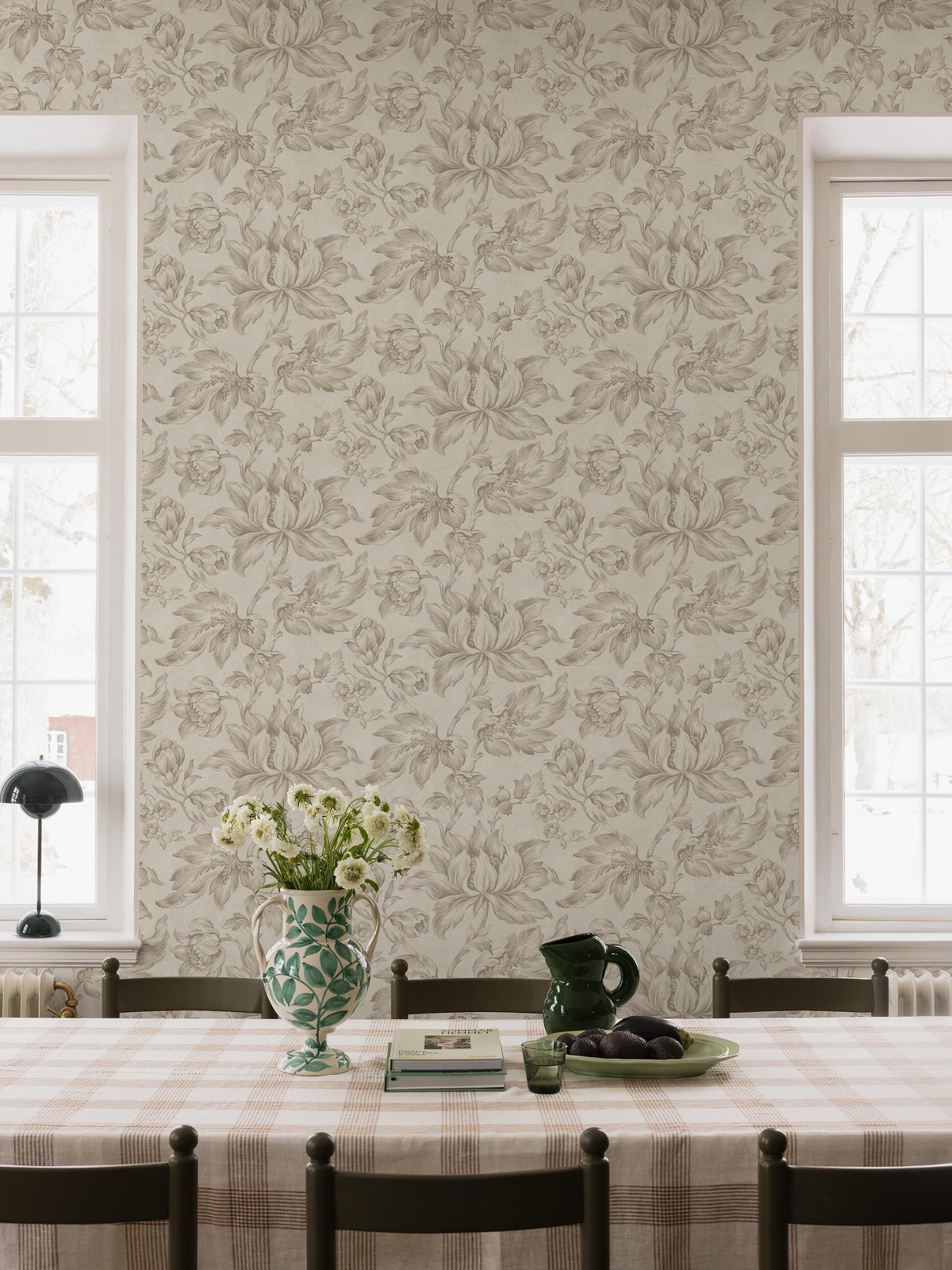 The light, large-floral Archive Flowers wallpaper is based on a hand-painted original from our historical archive. We have enlarged the motif to create a Contemporary, elegant wallpaper that truly makes a statement in the room.