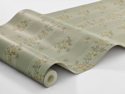 The Striped wallpaper Hufvudsta Gård combines romantic charm with the light, airy expression of the Gustavian style. Here, beige flowers with green leaves wind across light beige stripes – all set against a softly warm green background.