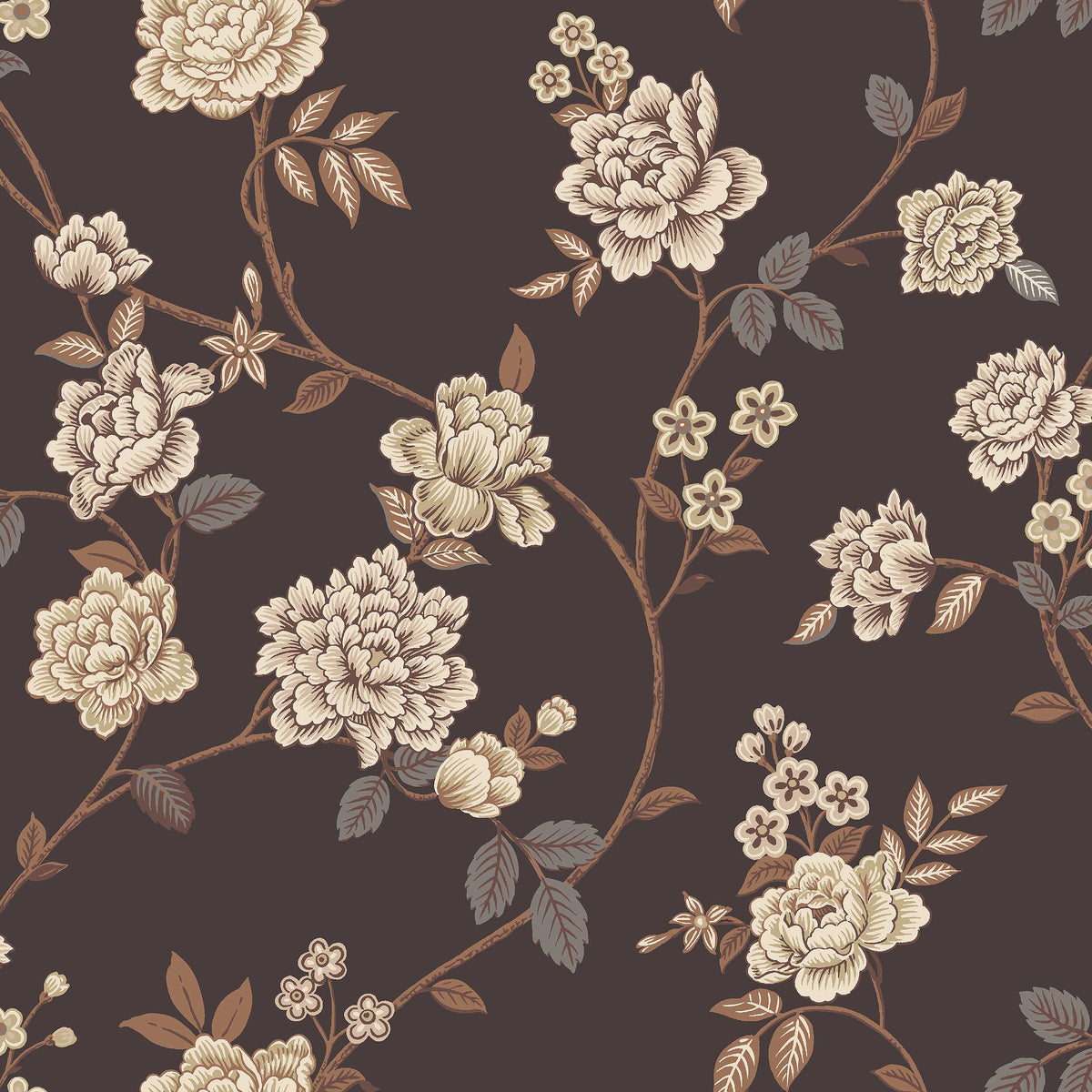The dark, large-floral wallpaper Peony Garden creates a romantic yet slightly dramatic impression, with its delicate floral vines surface-printed in beige, grey and brown on a warm brown-black background.