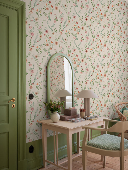 The light, Floral Bouquet Flowers wallpaper creates a soft, inviting atmosphere with its romantic pattern. Among eucalyptus and trailing ivy, flowers such as astrantia, dahlia, nasturtium, alstroemeria, and chrysanthemum bloom.