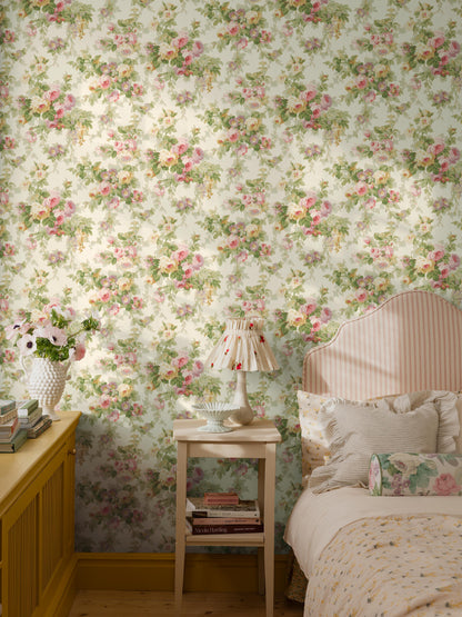 Lavish bouquets of densely petalled roses and winding bindweed adorn the Floral vintage wallpaper Sweet Dream Rose. 