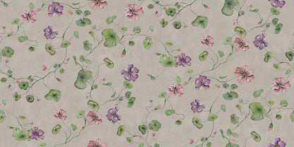 Violetta is a cozy, floral wallpaper, covered with delicate yet vibrant nasturtium flowers in pink and violet on a warm gray background, resembling a lime wall. 