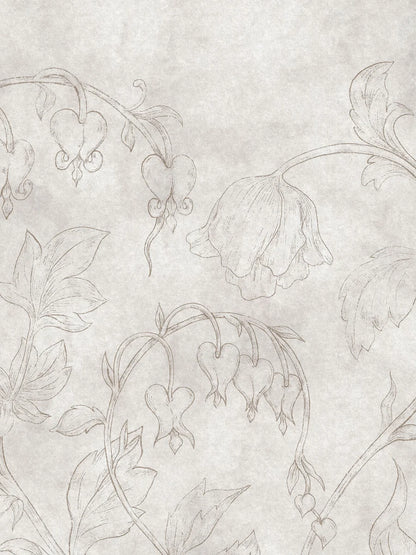 The light gray-beige wallpaper Burning Heart is adorned with delicate bleeding hearts and bellflowers on a discreetly marbled background. 