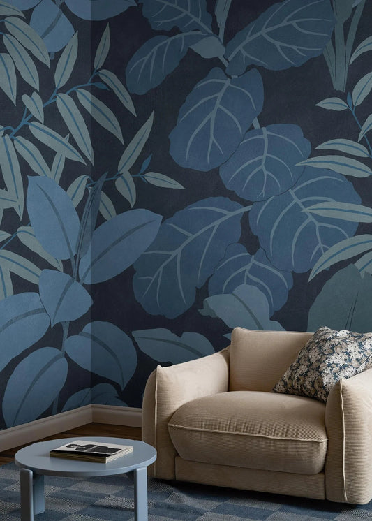 Grand Leaves is a lush, graphic wallpaper full of beautiful depth. The large-scale design features layer upon layer of stylized leaves in soothing blue tones, stretching from floor to ceiling.