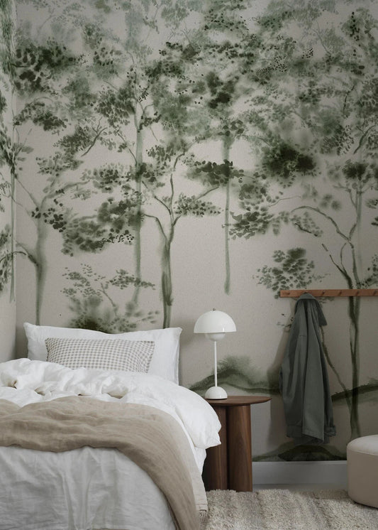 The Ink Forest mural brings a calm, dreamy atmosphere to any space with its stylised trees stretching from floor to ceiling, like a misty, open woodland.