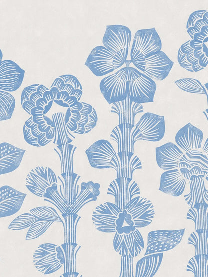 Across the mural wallpaper Storflax, majestic fantasy flowers stretch high towards the ceiling in a playful yet bold pattern, designed by Hanna Werning.