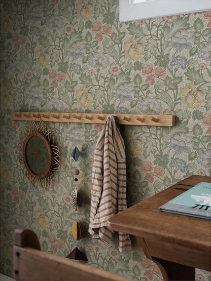 Featuring florals in bright and lovely red, yellow, blue and purple shades and foliage in soft green tones, our Jane wallpaper brings to the mind the sweet scents and sights of an English spring day. 