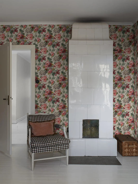 Colored in a palette of red, pink and green on a warm neutral background, our Madame wallpaper evokes the scent and warmth of a summer garden.