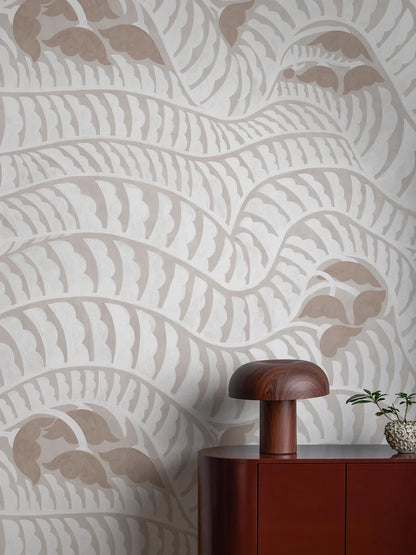 The light, graphic Garden Bell wallpaper is covered from floor to ceiling in a flowing, abstract pattern – like a meandering walk along winding gravel paths and blooming gardens