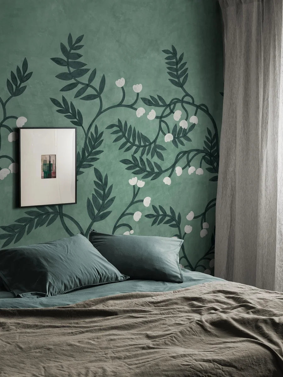 The Whispering Bell mural wallpaper is covered in winding branches with beautifully cut leaves and sweet little flower bells