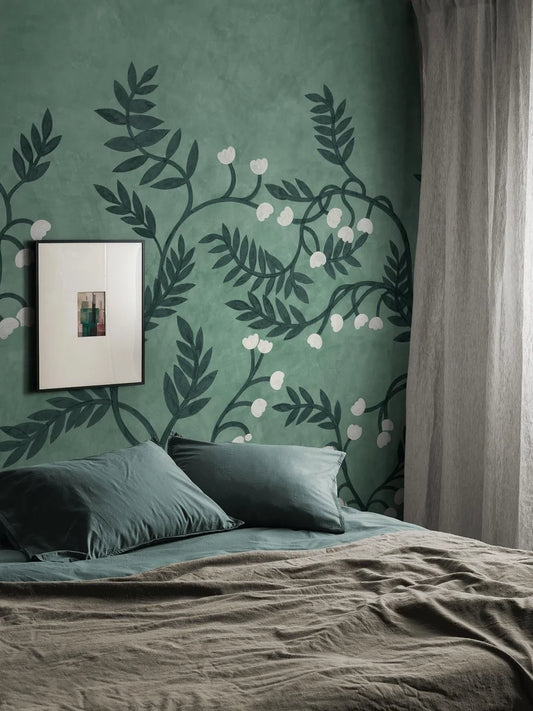 The Whispering Bell mural wallpaper is covered in winding branches with beautifully cut leaves and sweet little flower bells