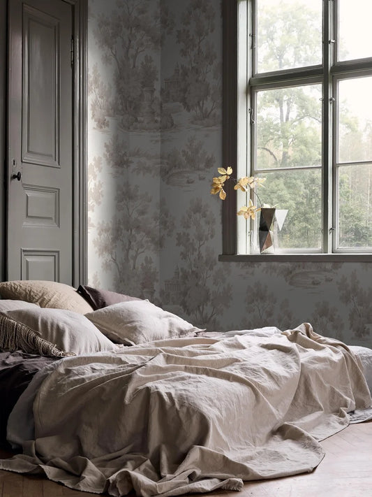 Grisaille is a light, decorative wallpaper with a stylized landscape motif in grey-beige tones on a white background.