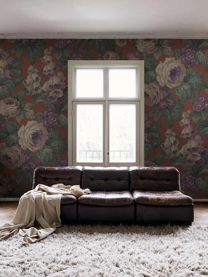 The large-flowered wallpaper Rose Magnifique is covered in roses, foxgloves, and other blooms in a lively, lush pattern