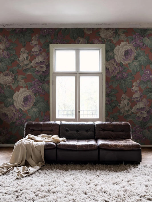 The large-flowered wallpaper Rose Magnifique is covered in roses, foxgloves, and other blooms in a lively, lush pattern