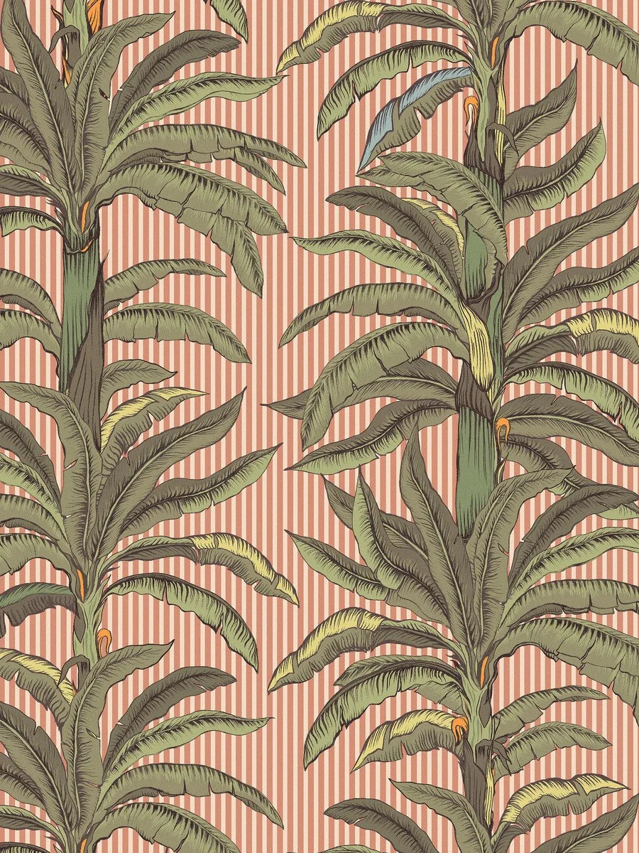Wallpaper printed custom fit on demand in multiple colorways. Here, green palms stand out against a warm apricot-pink background.