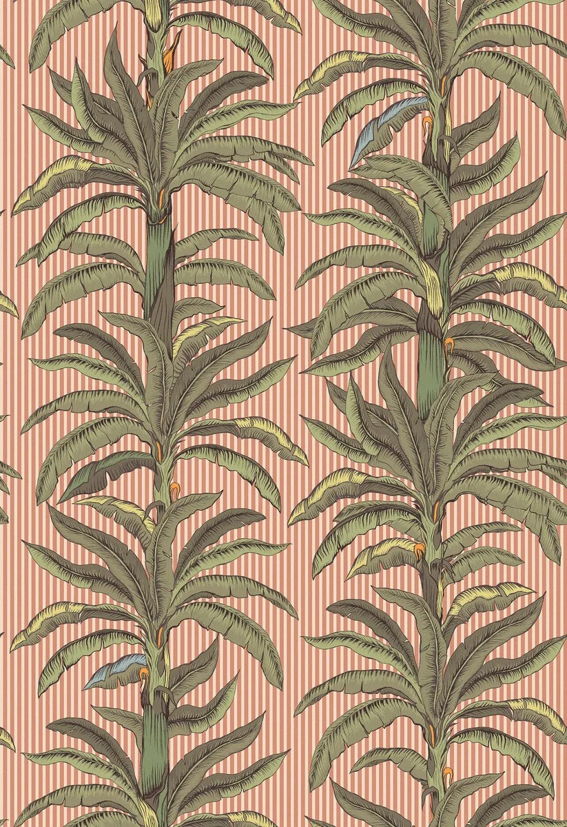 Wallpaper printed custom fit on demand in multiple colorways. Here, green palms stand out against a warm apricot-pink background.