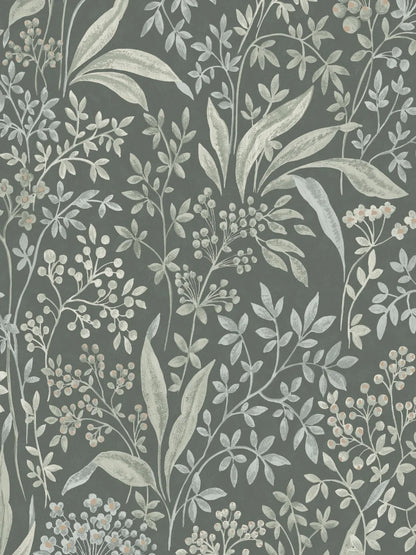 Nocturne Grand is a mural wallpaper featuring winding leaves, small flowers, and seed pods – a large-scale pattern softened by the chalk-like surface of the background. 
