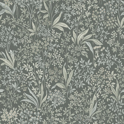Nocturne Grand is a mural wallpaper featuring winding leaves, small flowers, and seed pods – a large-scale pattern softened by the chalk-like surface of the background. 